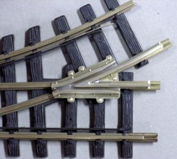 Zeige Details für Herzstück Messing für R1-Weiche, links Bild von Herzstück Messing für R1-Weiche, links