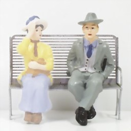 Zeige Details für Mann sitzend mit Cowboyhut Bild von Mann sitzend mit Cowboyhut