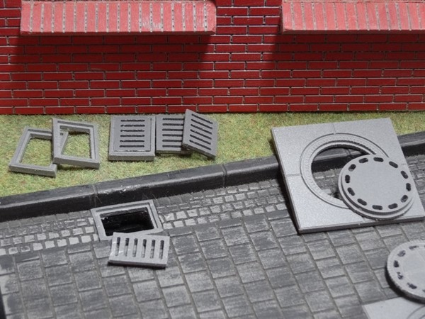 Picture of Manhole cover set for opening